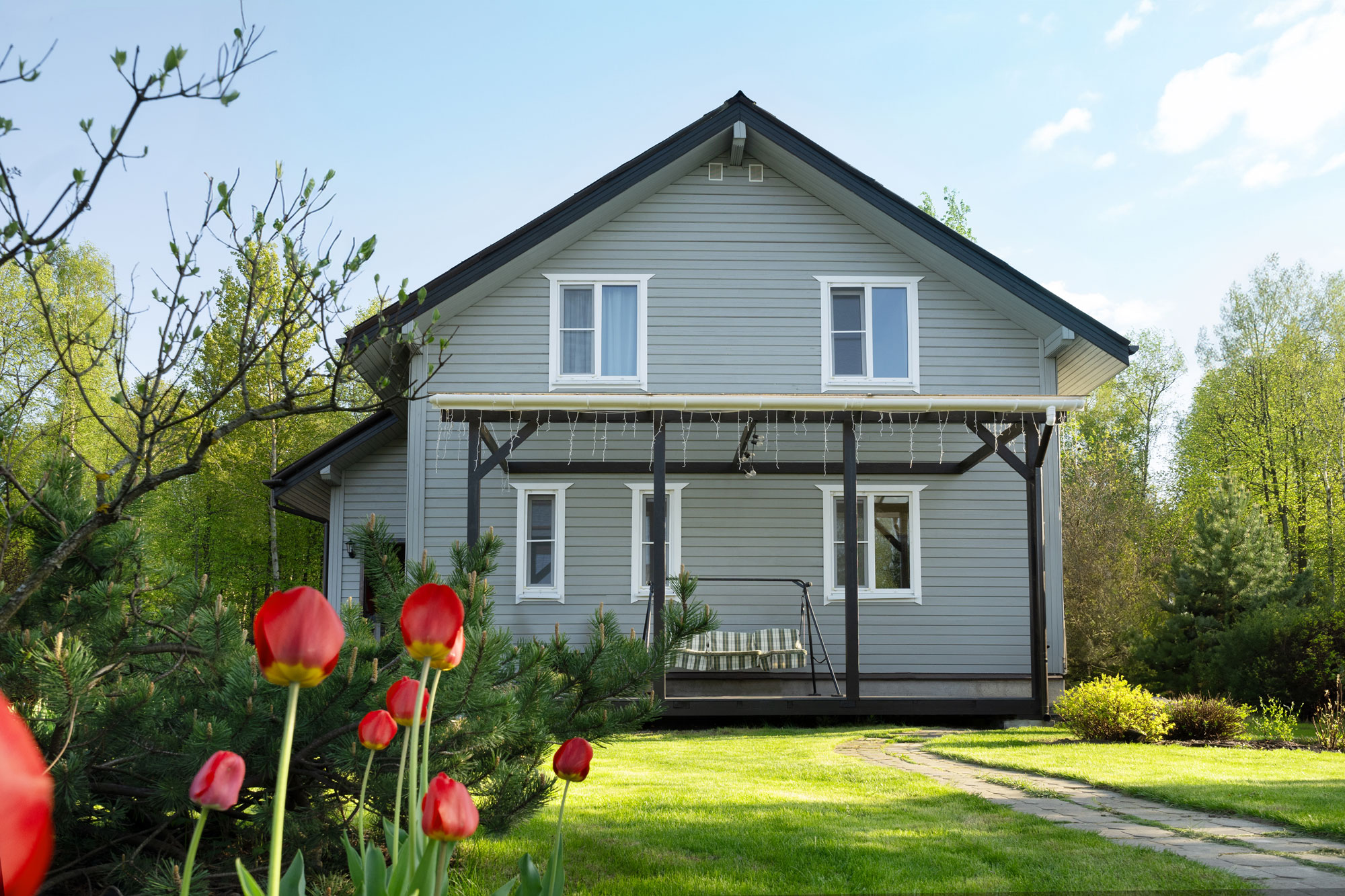 Cottagecore_Contemporary_House_Of_Timber_In_Countryside_In_Spring_Tulips_original_2521951 Exterior Painting Services, Woods Painting Enterprises LLC, Rochester, NY